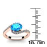 1 3/4 Carat Oval Shape Blue Topaz and Halo Diamond Ring In 14 Karat Rose Gold Image-5