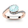 Aquamarine Ring: Aquamarine Jewelry: 1 1/2 Carat Oval Shape Aquamarine and Halo Diamond Ring In 14 Karat Rose Gold