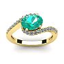 1 1/2 Carat Oval Shape Emerald and Halo Diamond Ring In 14 Karat Yellow Gold Image-1