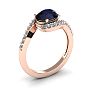 1 3/4 Carat Oval Shape Sapphire and Halo Diamond Ring In 14 Karat Rose Gold Image-2