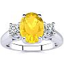 1 1/4 Carat Oval Shape Citrine and Two Diamond Ring In 14 Karat White Gold Image-1