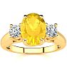1 1/4 Carat Oval Shape Citrine and Two Diamond Ring In 14 Karat Yellow Gold Image-1