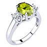 1 1/2 Carat Oval Shape Peridot and Two Diamond Ring In 14 Karat White Gold Image-2