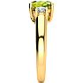 1 1/2 Carat Oval Shape Peridot and Two Diamond Ring In 14 Karat Yellow Gold Image-4