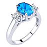 1 3/4 Carat Oval Shape Blue Topaz and Two Diamond Ring In 14 Karat White Gold Image-2