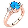 1 3/4 Carat Oval Shape Blue Topaz and Two Diamond Ring In 14 Karat Rose Gold Image-2