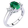 1 1/3 Carat Oval Shape Emerald and Two Diamond Ring In 14 Karat White Gold Image-2