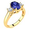 1 1/2 Carat Oval Shape Tanzanite and Two Diamond Ring In 14 Karat Yellow Gold Image-2