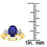 1 1/2 Carat Oval Shape Tanzanite and Two Diamond Ring In 14 Karat Yellow Gold Image-5