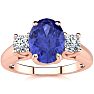 1 1/2 Carat Oval Shape Tanzanite and Two Diamond Ring In 14 Karat Rose Gold Image-1