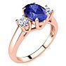 1 1/2 Carat Oval Shape Tanzanite and Two Diamond Ring In 14 Karat Rose Gold Image-2