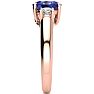 1 1/2 Carat Oval Shape Tanzanite and Two Diamond Ring In 14 Karat Rose Gold Image-4