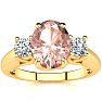 1-1/3 Carat Oval Shape Morganite and Two Diamond Ring In 14 Karat Yellow Gold Image-1