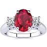 1 3/4 Carat Oval Shape Ruby and Two Diamond Ring In 14 Karat White Gold Image-1