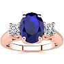 1 3/4 Carat Oval Shape Sapphire and Two Diamond Ring In 14 Karat Rose Gold Image-1