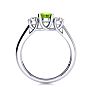 1 Carat Oval Shape Peridot and Two Diamond Ring In 14 Karat White Gold Image-3