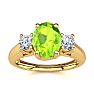 1 Carat Oval Shape Peridot and Two Diamond Ring In 14 Karat Yellow Gold Image-1