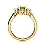 1 Carat Oval Shape Peridot and Two Diamond Ring In 14 Karat Yellow Gold Image-3
