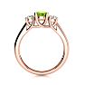1 Carat Oval Shape Peridot and Two Diamond Ring In 14 Karat Rose Gold
 Image-3