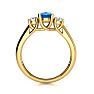 1 1/5 Carat Oval Shape Blue Topaz and Two Diamond Ring In 14 Karat Yellow Gold
 Image-3