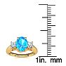 1 1/5 Carat Oval Shape Blue Topaz and Two Diamond Ring In 14 Karat Yellow Gold
 Image-5