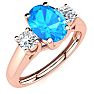 1 1/5 Carat Oval Shape Blue Topaz and Two Diamond Ring In 14 Karat Rose Gold
 Image-2