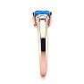 1 1/5 Carat Oval Shape Blue Topaz and Two Diamond Ring In 14 Karat Rose Gold
 Image-4