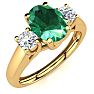 1 Carat Oval Shape Emerald and Two Diamond Ring In 14 Karat Yellow Gold Image-2