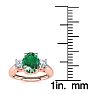 1 Carat Oval Shape Emerald and Two Diamond Ring In 14 Karat Rose Gold Image-5