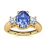 1.15 Carat Oval Shape Tanzanite and Two Diamond Ring In 14 Karat Yellow Gold Image-1