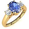 1.15 Carat Oval Shape Tanzanite and Two Diamond Ring In 14 Karat Yellow Gold Image-2