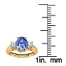 1.15 Carat Oval Shape Tanzanite and Two Diamond Ring In 14 Karat Yellow Gold Image-5