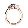 1.15 Carat Oval Shape Tanzanite and Two Diamond Ring In 14 Karat Rose Gold
 Image-3