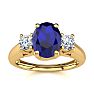 1 1/5 Carat Oval Shape Sapphire and Two Diamond Ring In 14 Karat Yellow Gold Image-1
