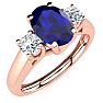 1 1/5 Carat Oval Shape Sapphire and Two Diamond Ring In 14 Karat Rose Gold Image-2