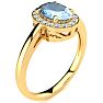 Aquamarine Ring: Aquamarine Jewelry: 1 Carat Oval Shape Aquamarine and Halo Diamond Ring In 14K Yellow Gold Image-2