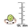 1 Carat Oval Shape Peridot and Halo Diamond Ring In 14 Karat Rose Gold Image-5
