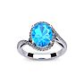 1 1/4 Carat Oval Shape Blue Topaz and Halo Diamond Ring In 14 Karat White Gold Image-1