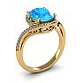 1 1/4 Carat Oval Shape Blue Topaz and Halo Diamond Ring In 14 Karat Yellow Gold Image-2