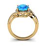 1 1/4 Carat Oval Shape Blue Topaz and Halo Diamond Ring In 14 Karat Yellow Gold Image-4