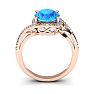 1 1/4 Carat Oval Shape Blue Topaz and Halo Diamond Ring In 14 Karat Rose Gold Image-4
