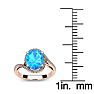 1 1/4 Carat Oval Shape Blue Topaz and Halo Diamond Ring In 14 Karat Rose Gold Image-5