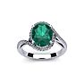 1 Carat Oval Shape Emerald and Halo Diamond Ring In 14 Karat White Gold Image-1