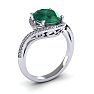 1 Carat Oval Shape Emerald and Halo Diamond Ring In 14 Karat White Gold Image-2