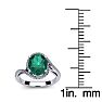 1 Carat Oval Shape Emerald and Halo Diamond Ring In 14 Karat White Gold Image-5