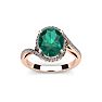 1 Carat Oval Shape Emerald and Halo Diamond Ring In 14 Karat Rose Gold Image-1
