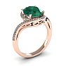 1 Carat Oval Shape Emerald and Halo Diamond Ring In 14 Karat Rose Gold Image-2