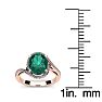 1 Carat Oval Shape Emerald and Halo Diamond Ring In 14 Karat Rose Gold Image-5