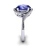 1 1/4 Carat Oval Shape Tanzanite and Halo Diamond Ring In 14 Karat White Gold Image-3