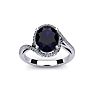 1 1/4 Carat Oval Shape Sapphire and Halo Diamond Ring In 14 Karat White Gold Image-1